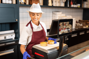 Avery Berkel scale in use at a butchers counter