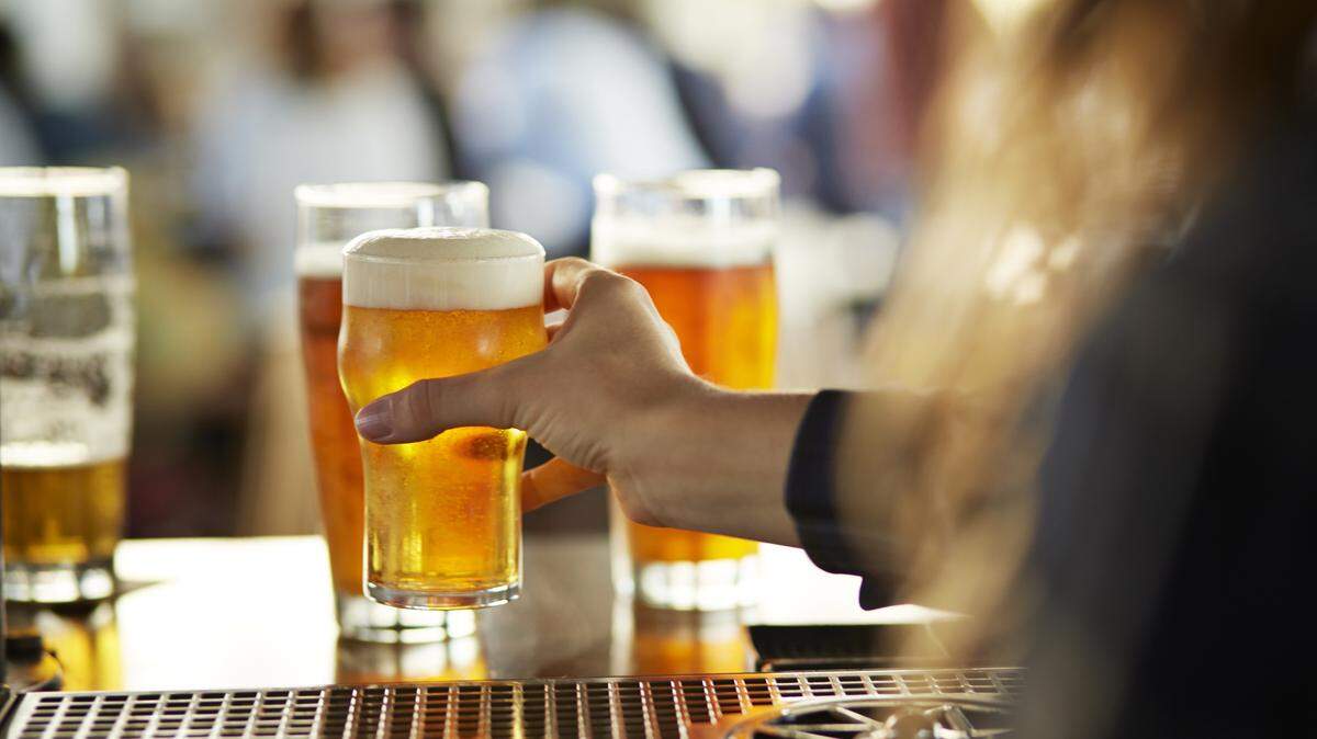 Serving pint in a pub