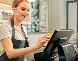 woman using epos till
