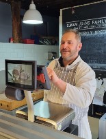 man using Avery scale