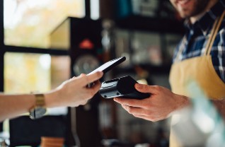 person making card machine payment