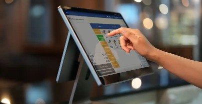 hand touching epos screen