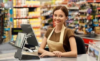 woman serving at epos till