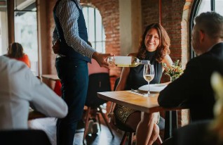 wine being poured at table