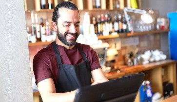 man using till system